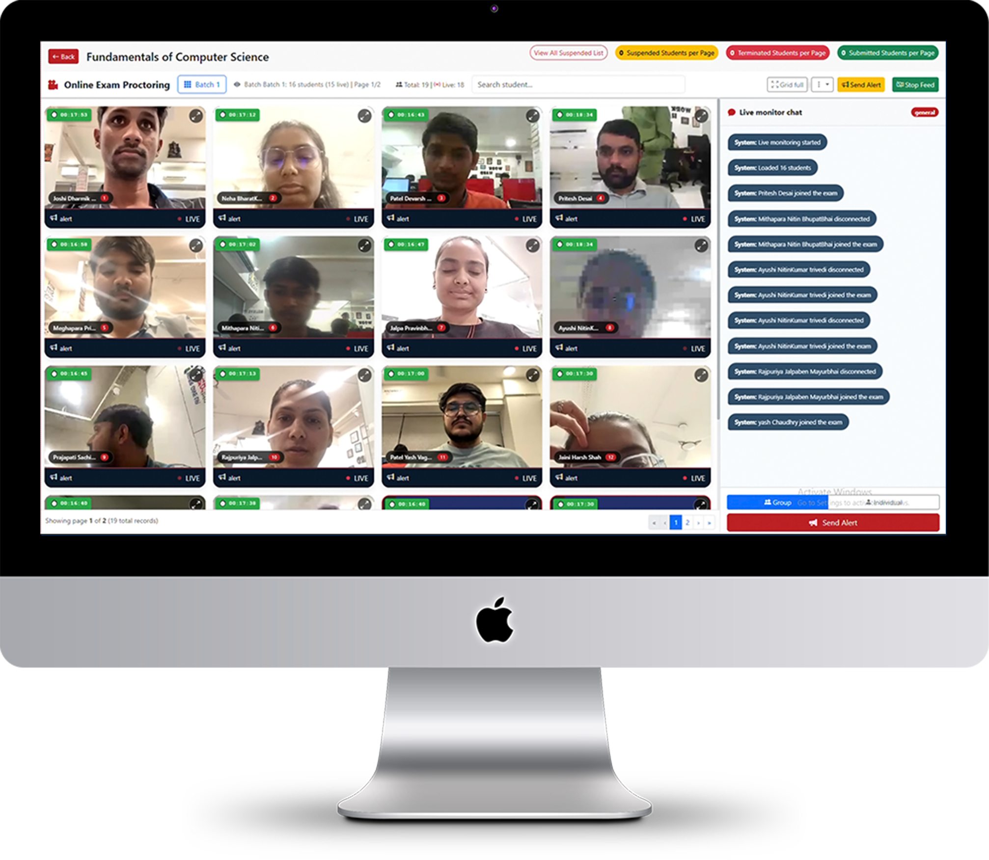 Live exam proctoring dashboard on a desktop monitor, with candidate video feeds and a live monitor chat